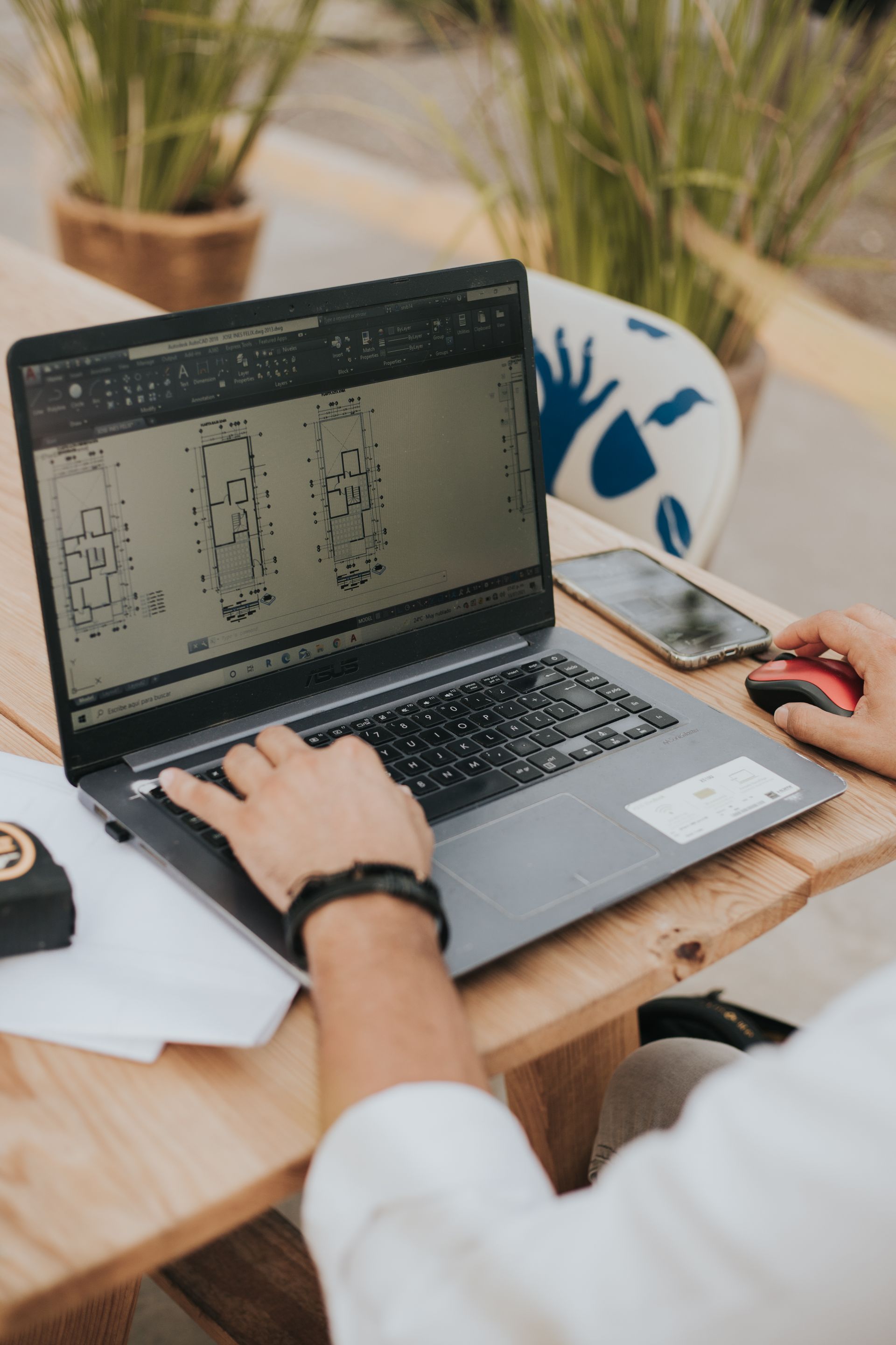 Property sourcer researching and analysing potential investment properties